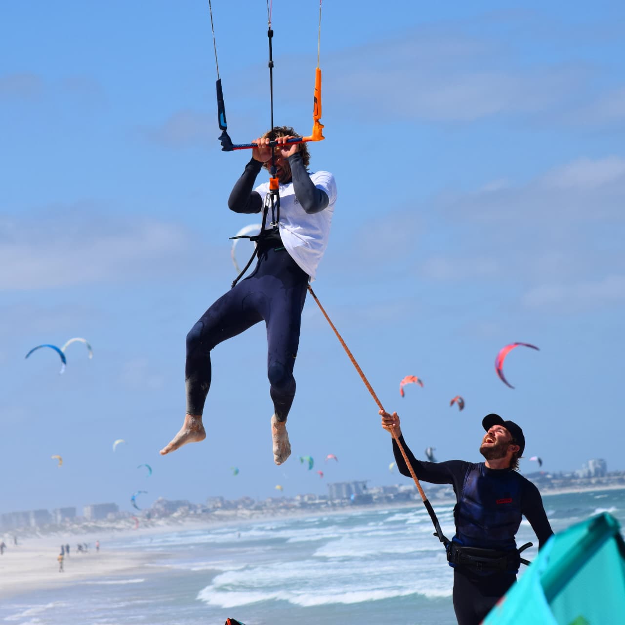 Khaya's kite crew hanging out together on the beach